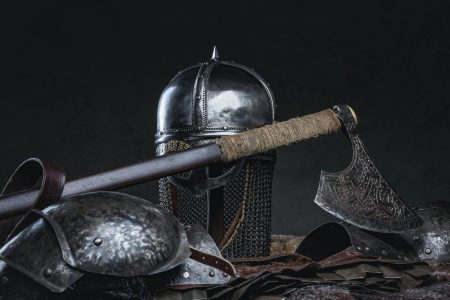 Medieval suit of armor of knight against dark background